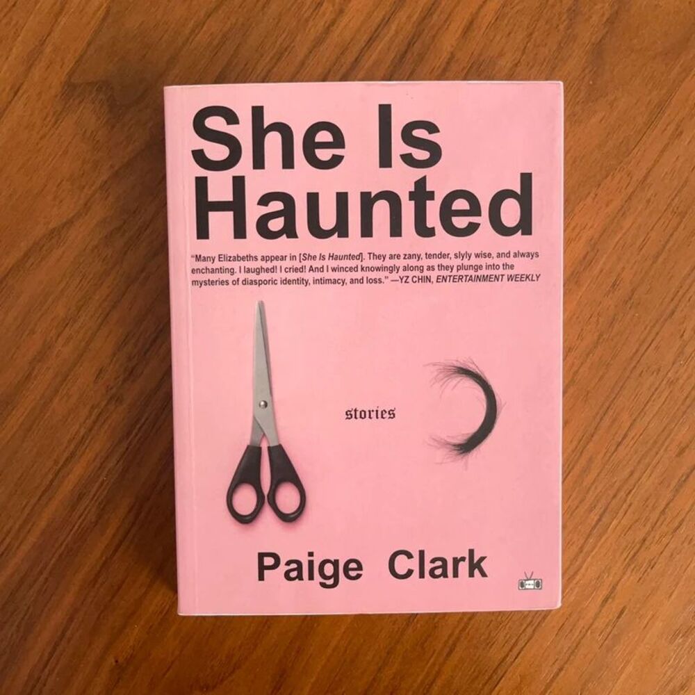She Is Haunted by Paige Clark